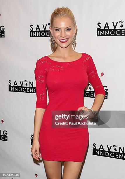 Miss USA 2009 / Actress Kristen Dalton attends the "Hope...Pass It On" Gala at the Sofitel Hotel on December 1, 2012 in Los Angeles, California.