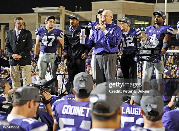 Head coach Bill Snyder of the Kansas State Wildcats address his teammates and crowd after defeating the Texas Longhorns for the Big 12 Championship...