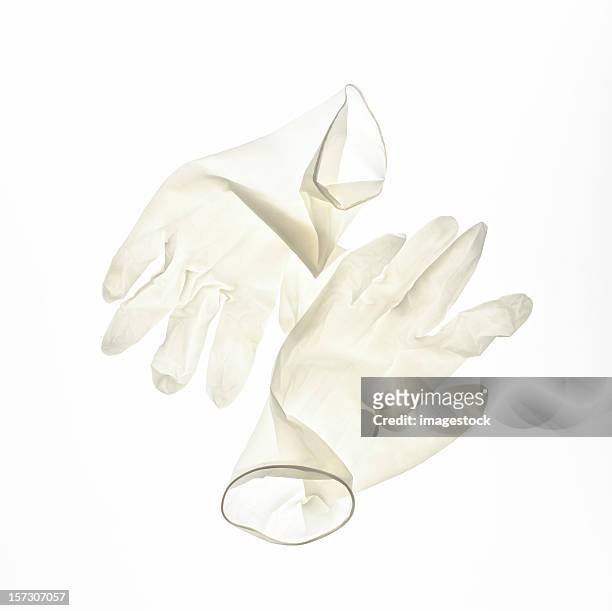 surgery gloves - surgical glove stock pictures, royalty-free photos & images