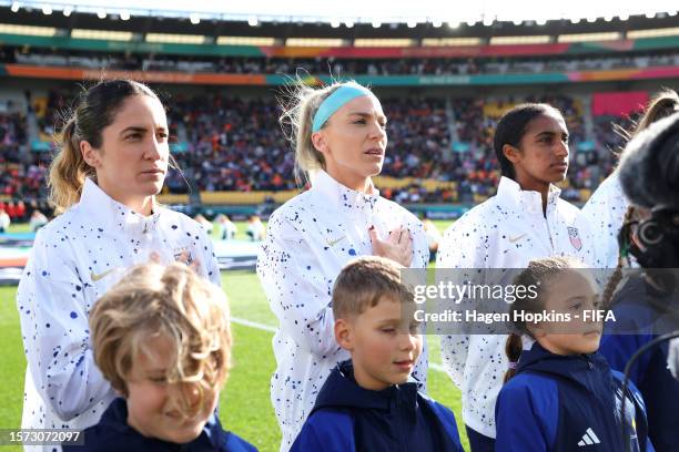 Savannah Demelo, Julie Ertz and Naomi Girma of USA line up for the national anthem prior to the FIFA Women's World Cup Australia & New Zealand 2023...