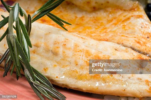 saute fillet of fish - tilapia stock pictures, royalty-free photos & images