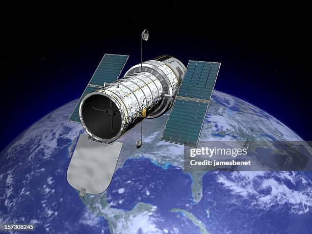 hubble space telescope with earth - hubble space telescope stockfoto's en -beelden