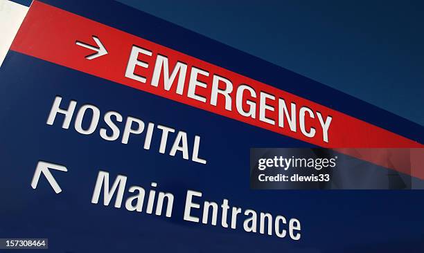 red and white sign stating emergency with an arrow - entrance sign stock pictures, royalty-free photos & images