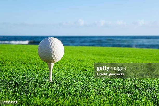 oceanside golf - golf ball water stock pictures, royalty-free photos & images