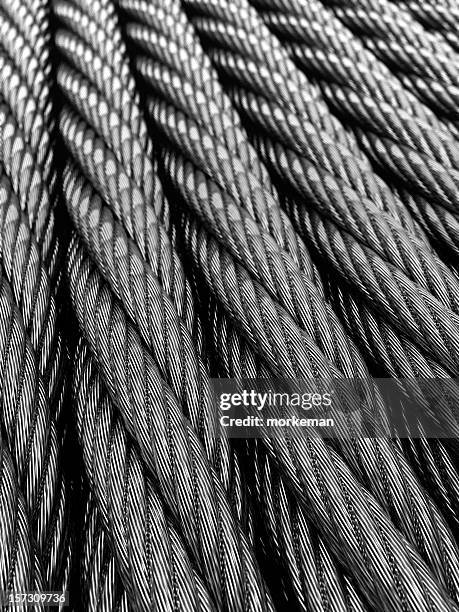 close up of steel twisted cables - wire rope stock pictures, royalty-free photos & images