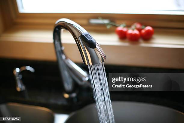 kitchen water faucet - kitchen sink water stock pictures, royalty-free photos & images