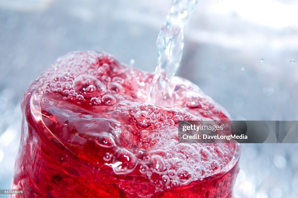 Close-up of a bubbly red drink