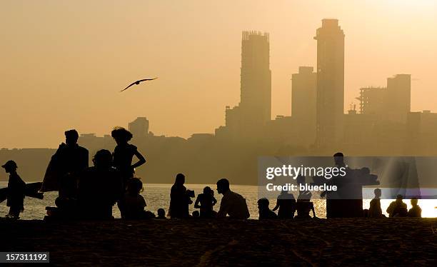 city and silhouettes - mumbai crowd stock pictures, royalty-free photos & images