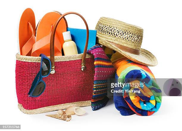 summer vacation beach bag with supplies isolated on white background - groep objecten stockfoto's en -beelden