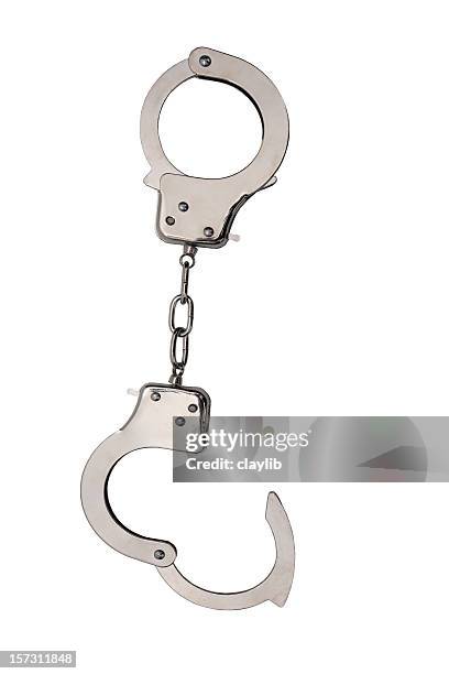 handcuffs - handboeien stockfoto's en -beelden
