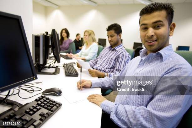 Admin Using Computer 187 School Admin On Computer Stock Photos, High-Res Pictures, and ...
