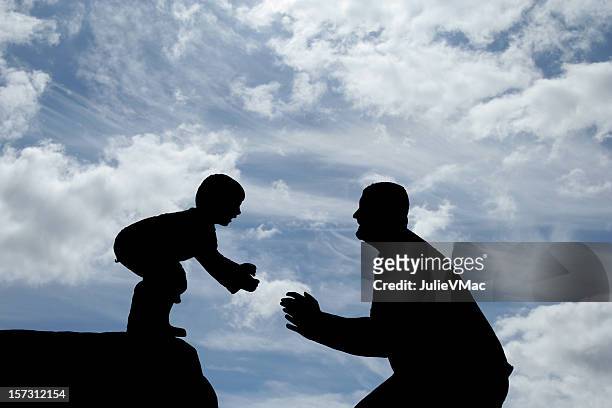 padre e figlio - leap of faith modo di dire inglese foto e immagini stock