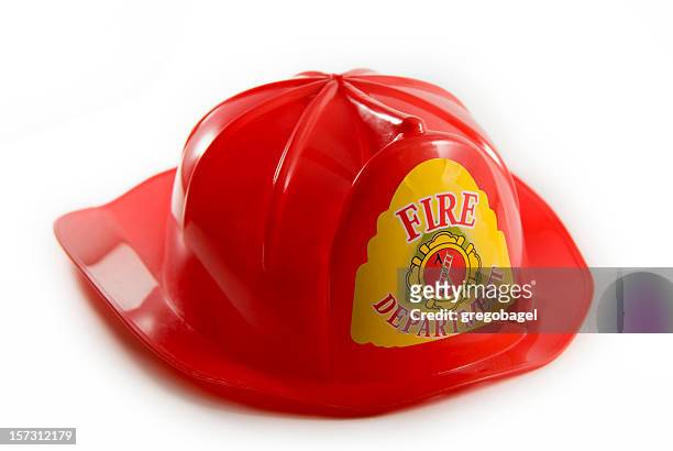 toy fireman's hat - firefighters helmet stock pictures, royalty-free photos & images