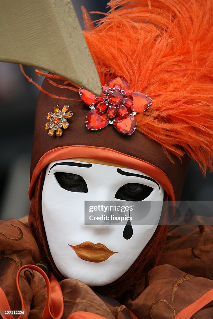 Carnival mask: tear