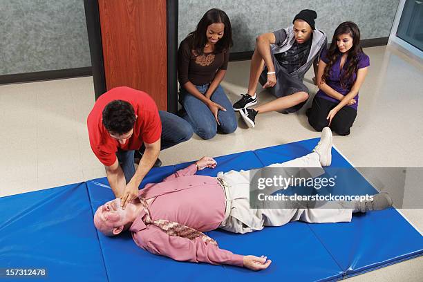 Checking Pulse First Aid 893 First Aid Cpr Practice Stock Photos, High-Res Pictures, and Images ...