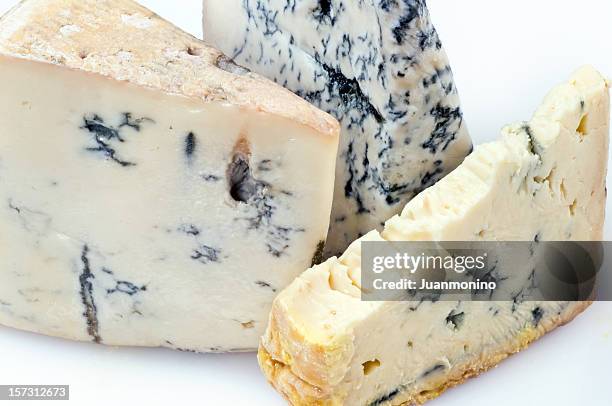 three gorgonzola cheeses - gorgonzola stock pictures, royalty-free photos & images