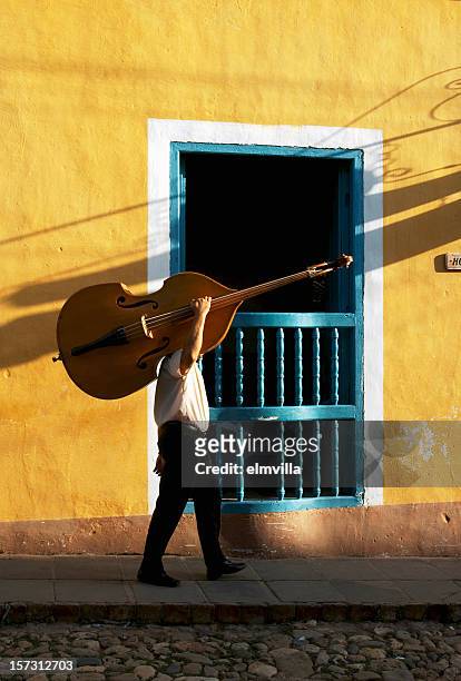 cuban bass player - caribbean musical instrument stock pictures, royalty-free photos & images