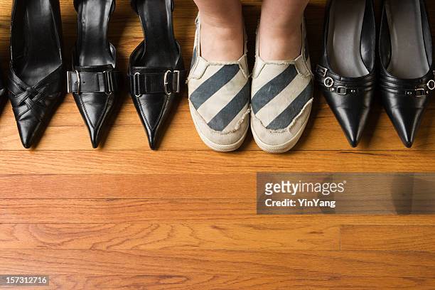 woman wearing comfortable sports shoes with dress heels variety selection - pointed foot stock pictures, royalty-free photos & images