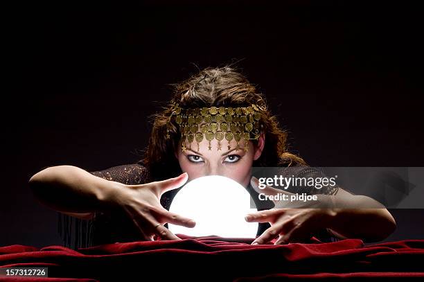 mysterious fortune teller - fortune telling stock pictures, royalty-free photos & images