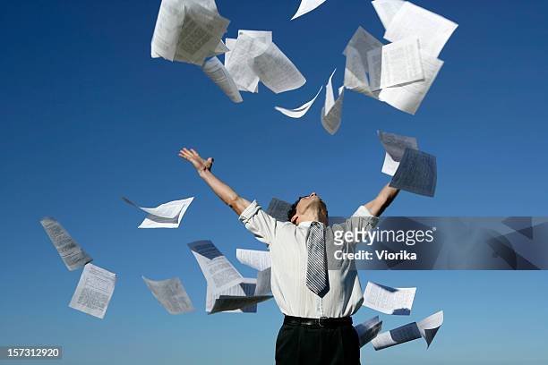 businessman throwing papers - throwing stock pictures, royalty-free photos & images
