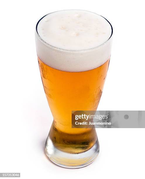 glass of cold draft pilsen beer - beer glasses stock pictures, royalty-free photos & images