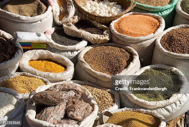 bags full of spices and herbes on a market - uganda stock pictures, royalty-free photos & images