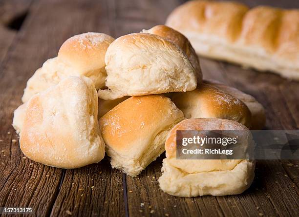 bread on wood - bun stock pictures, royalty-free photos & images