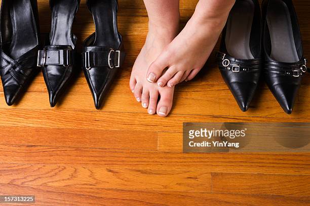 dress shoes and high heels with woman's feet on floor - pointed foot stock pictures, royalty-free photos & images