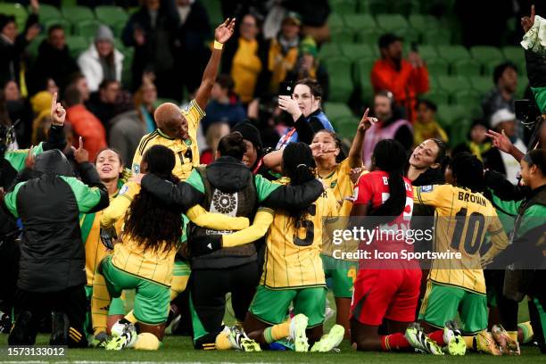 Deneisha Blackwood of Jamaica dances as Jamaican players celebrate during the Women's World Cup football match between Jamaica and Brazil at AAMI...