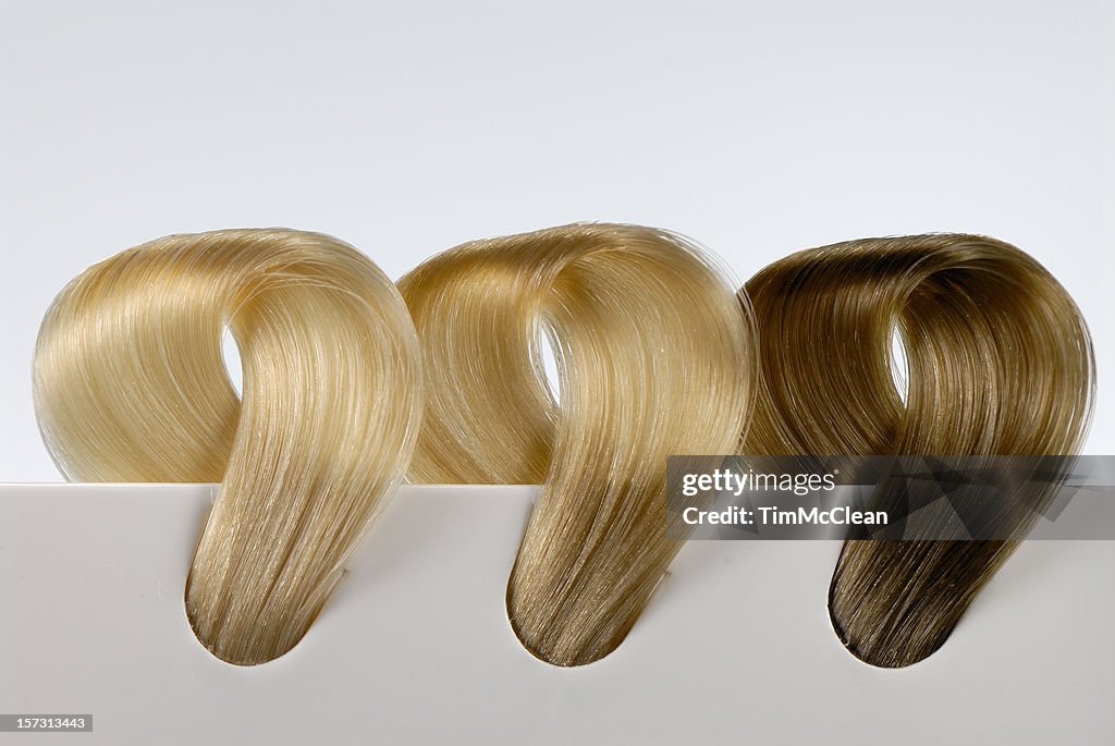 Three blonde hair swatches