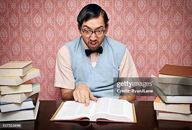 nerd student studies his homework hard - student reading book stockfoto's en -beelden