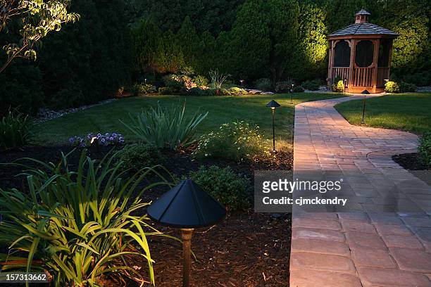 oasi di sera - giardino ornamentale foto e immagini stock