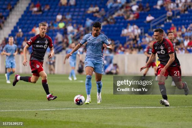 Monsef Bakrar of New York City FC dribbles the ball against Toronto FC during the first half of a 2023 Leagues Cup match at Red Bull Arena on July...