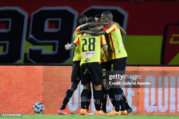 Danilo Santacruz of Pereira celebrates with teammates after scoring the team's first goal during the Copa CONMEBOL Libertadores round of 16 match...