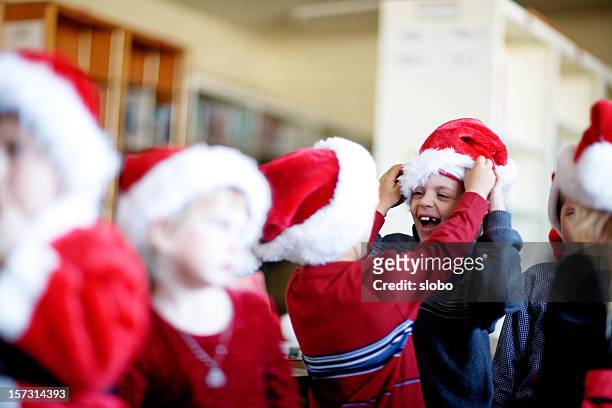 little santas get ready to put on a show - children theater stock pictures, royalty-free photos & images