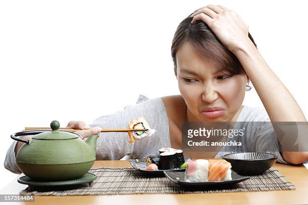 pretty asian woman tired of japanese food - rich fury stock pictures, royalty-free photos & images