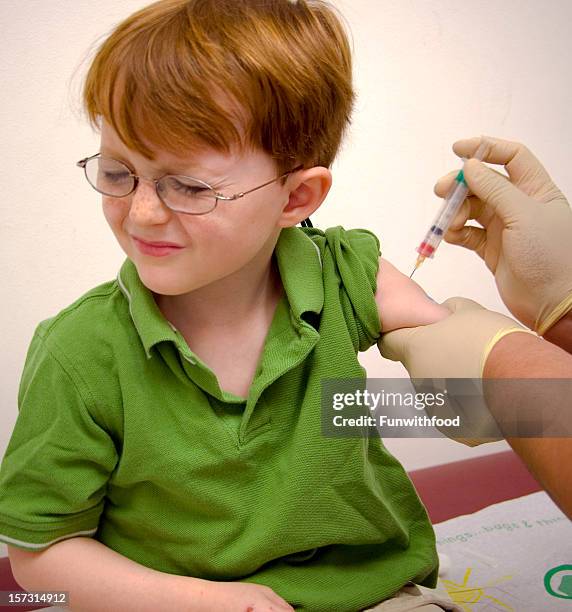 Child Receiving Injection 3,282 Boy Getting An Injection Stock Photos, High-Res Pictures, and ...