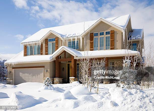 snow covered house - winter house stock pictures, royalty-free photos & images