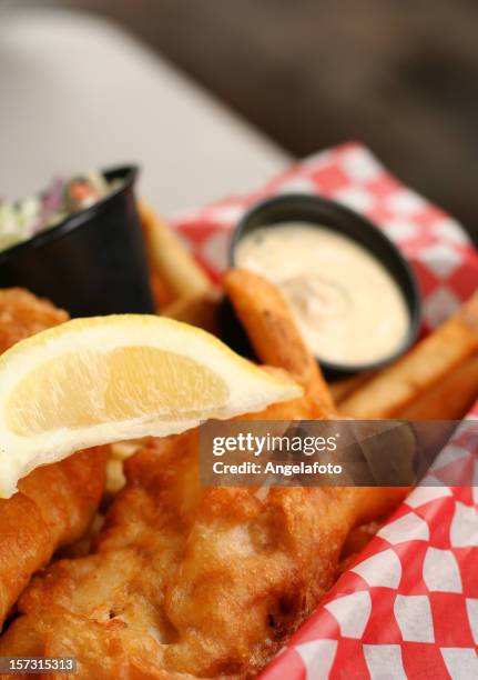 fish and chips detail with lemon slice, cream - tartar sauce stock pictures, royalty-free photos & images