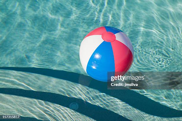 swimming pool - beach ball pool stock pictures, royalty-free photos & images
