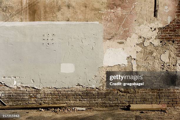 exposing brick - alley stock pictures, royalty-free photos & images