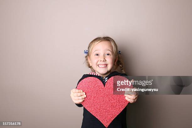 giving my heart - giving a girl head stock pictures, royalty-free photos & images