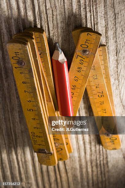 carpenter's old tools - duimstok stockfoto's en -beelden