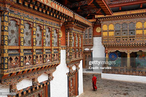 monk in punakha temple - bhutan monk stock pictures, royalty-free photos & images