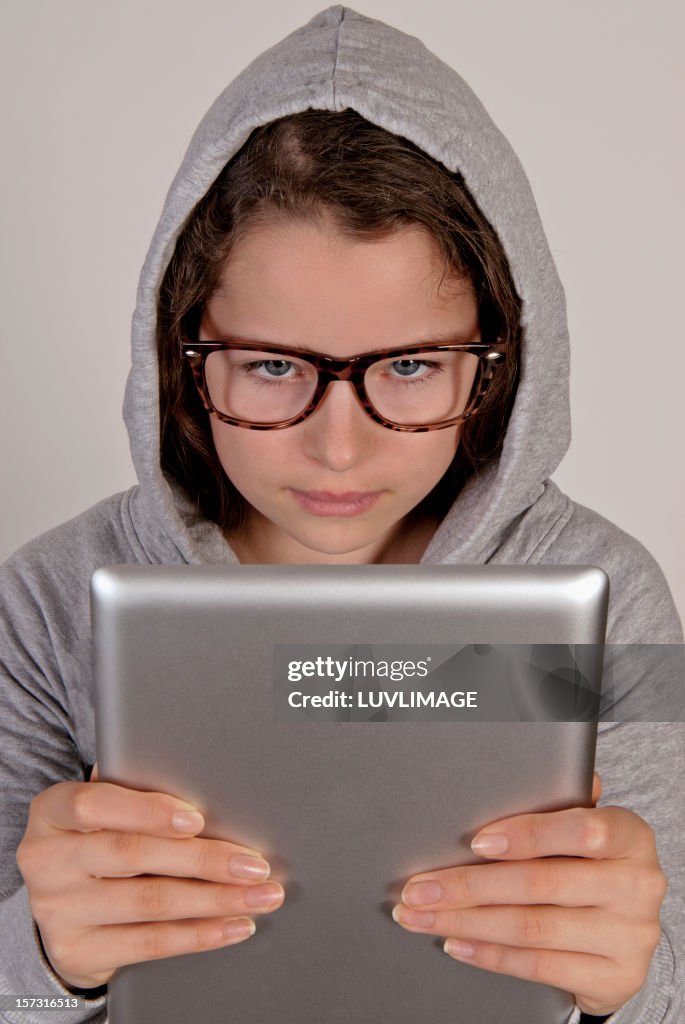 Teenage girl holding a digital tablet