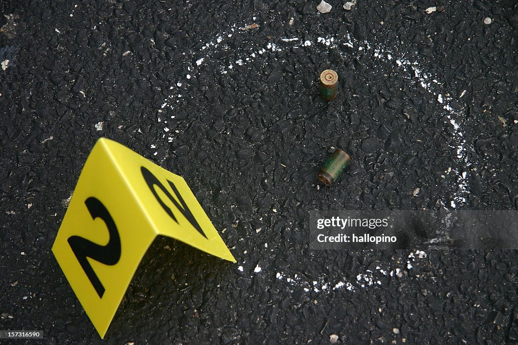 Crime scene number and chalk outline