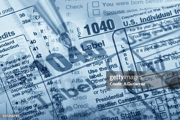 confused taxes - 1040 tax form stock pictures, royalty-free photos & images