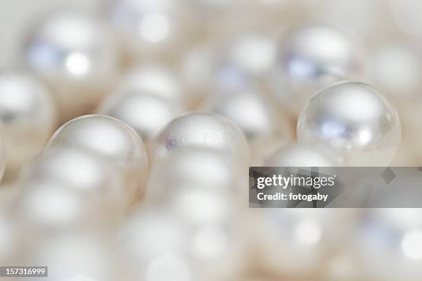 pearls - jewellery background stock pictures, royalty-free photos & images