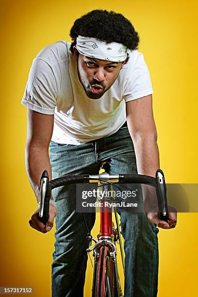 müde trendige junge mann auf der straße mit dem fahrrad - vintage funny black and white stock-fotos und bilder