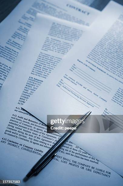 pen lying on contact - legal documents stock pictures, royalty-free photos & images